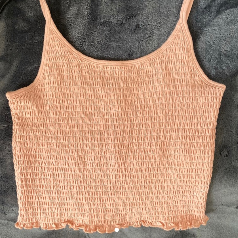 pink ruffled tank top